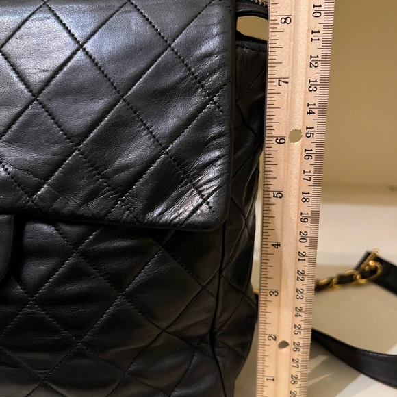 CHANEL Black Quilted Backpack with Gold Logo - Picture 6 of 16